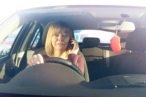 istock Driving whilst on the phone 463076995