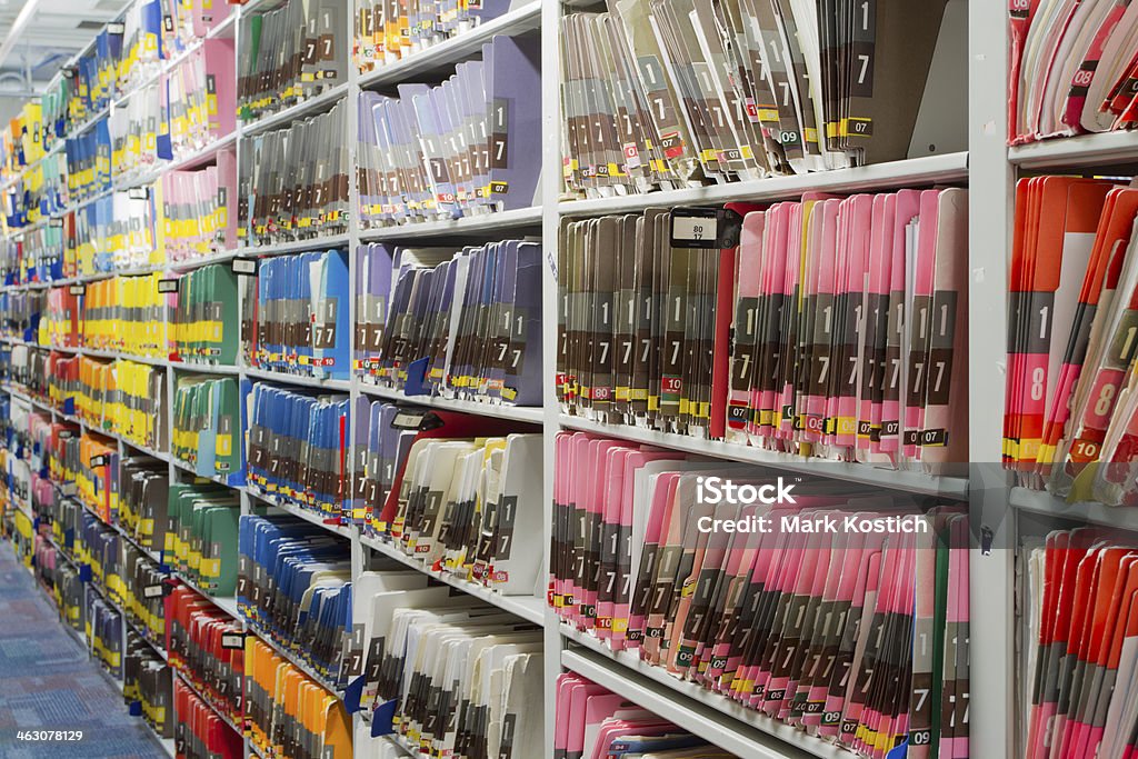 Rows of Colorful Medical Records - Patient Charts Chart Stock Photo