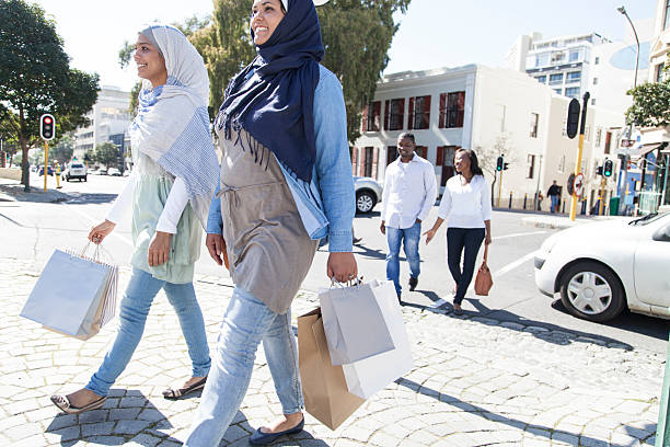 istock Two group of friends going for a walk after shopping 463080045