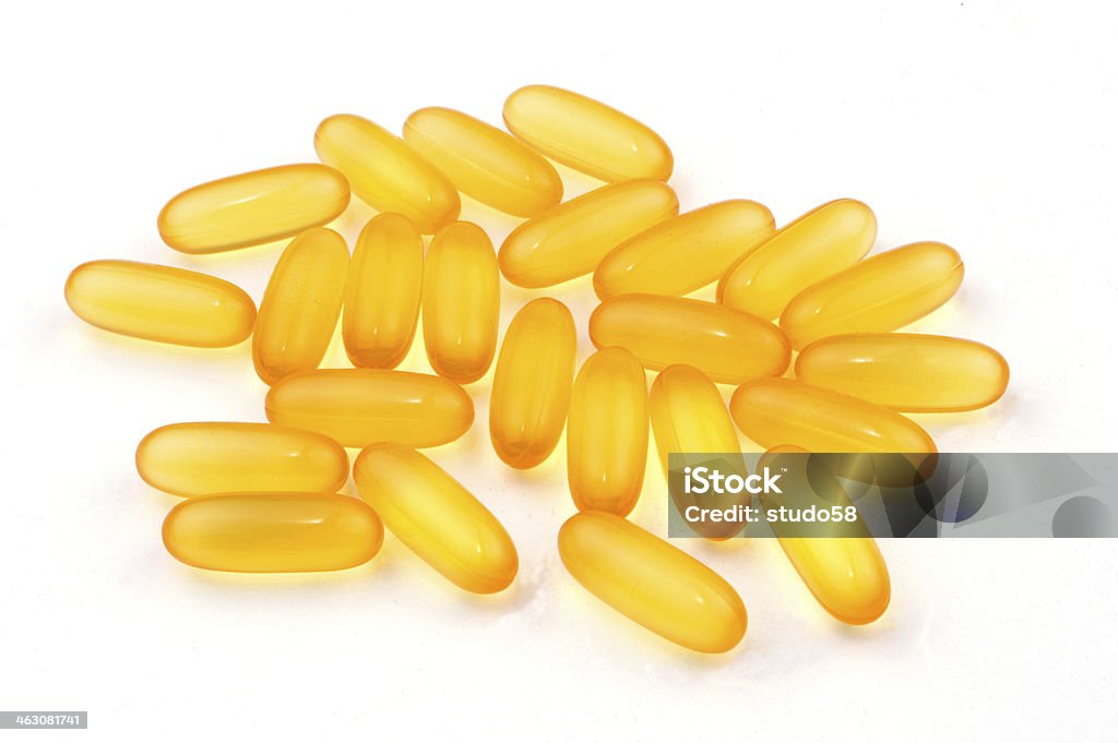 gel capsules gel vitamin capsules on White background Capsule - Medicine Stock Photo