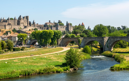 Carcassonne (Aude, Languedoc-Roussillon, France) - The historic bridge and the river in a summer afternoon