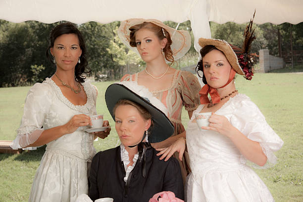 istock Fashion: Victorian style women have afternoon tea. 463086291