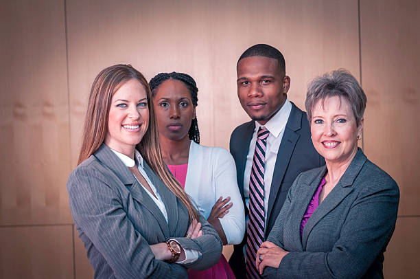 istock Group of diverse businesspeople standing with their senior executive (IV) 463094815