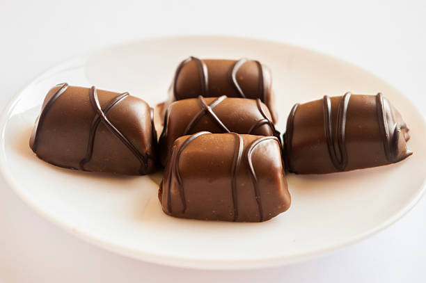 istock Tasty chocolate bonbon isolated on a white background 463096423