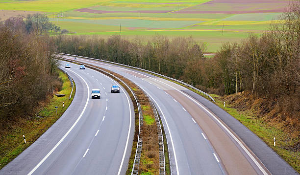 istock Cars driving on highway 463097997