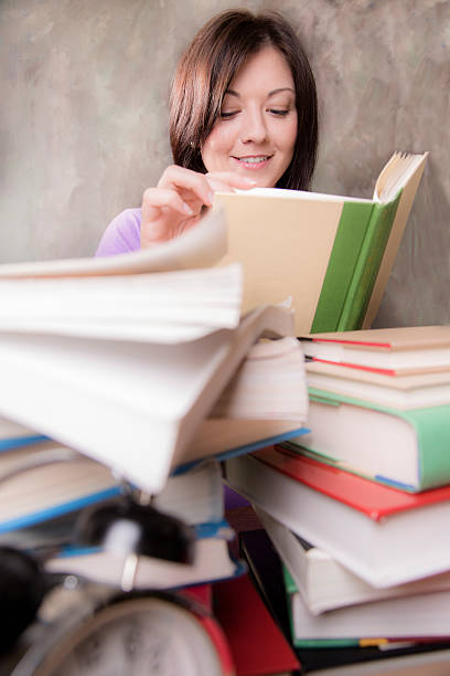 istock Education: Woman studies in college dorm room. 463098061