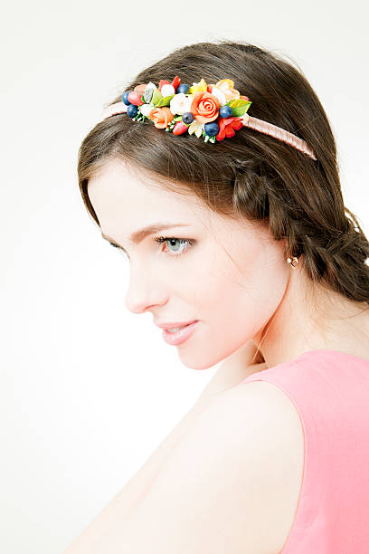istock Young beautiful woman with flower wreath on head 463101799