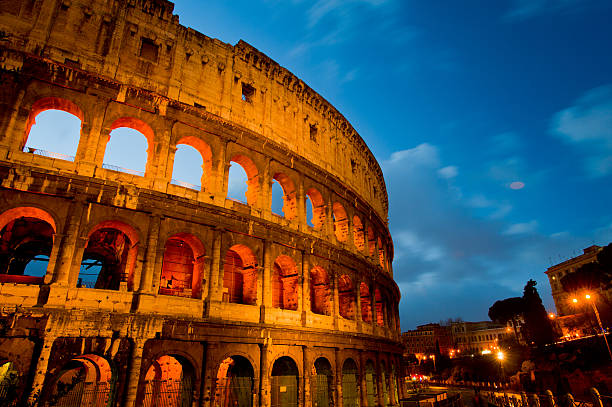 istock Coliseum by night with traffic, Rome Italy 463103647