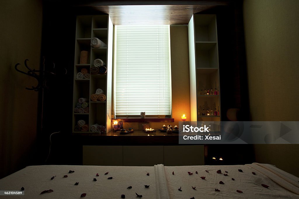 Massage room with candles and flovers Beauty Spa Stock Photo