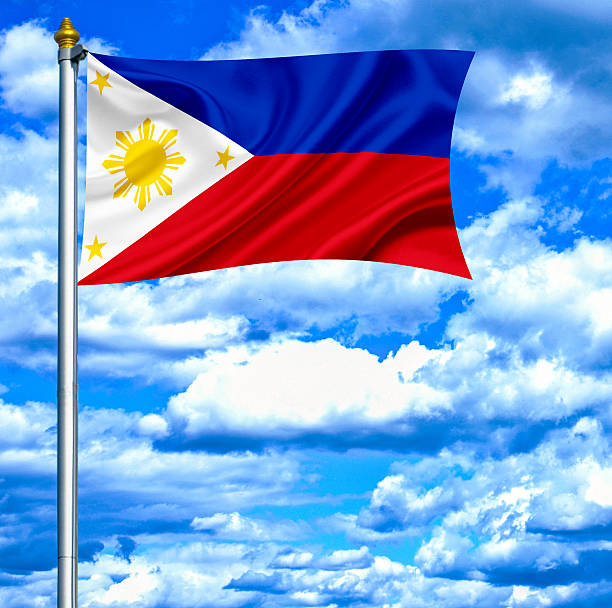 istock Philippines waving flag against blue sky 463105161