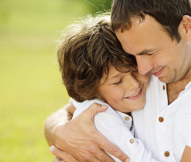 istock Father and son in nature 463111037