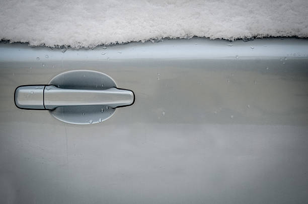 istock Snowy Car Door 463111815