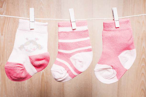 istock Baby girl socks 463113225