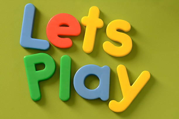 istock Lets Play words in colorful plastic letters 463120951