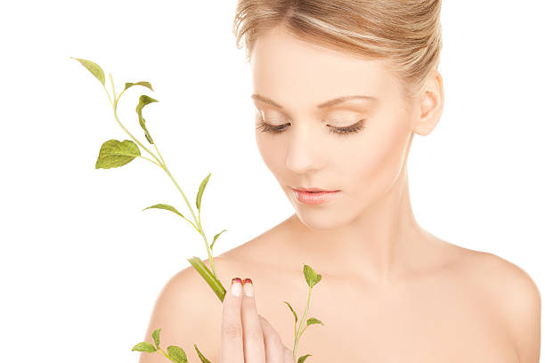 istock woman with green sprout 463121961