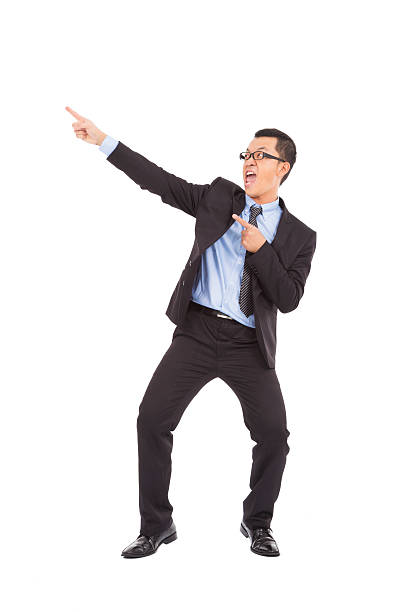 istock happy businessman dancing  a funny gesture 463122471