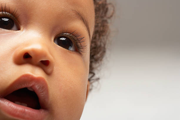 istock Curious Baby Boy Looking Away 463122553