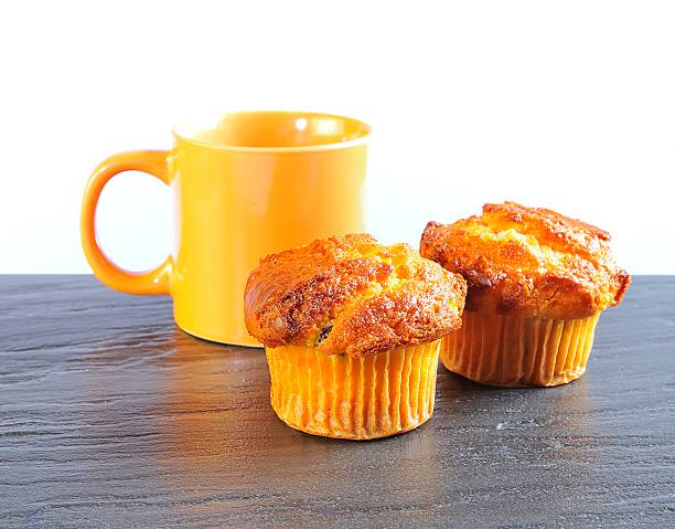 Muffins. Home made muffins isolated on white background.Home made muffins isolated on white background. obesidade stock pictures, royalty-free photos & images