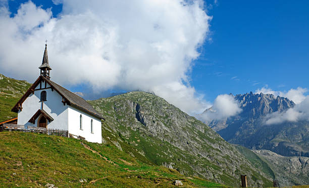 istock Landscape with church in the alps 463123487