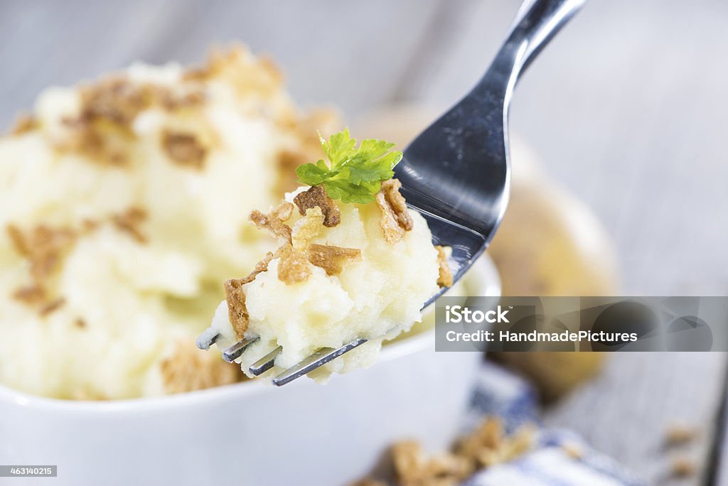 Fresh made Mashed Potatoes Fresh made Mashed Potatoes on vintage background Boiled Stock Photo