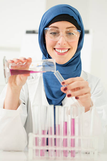 istock Middle Eastern Woman With Hijab Working in a lab. 463141267