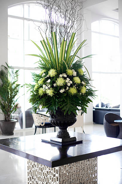 Beautiful white and green flower arrangement in elegant foyer