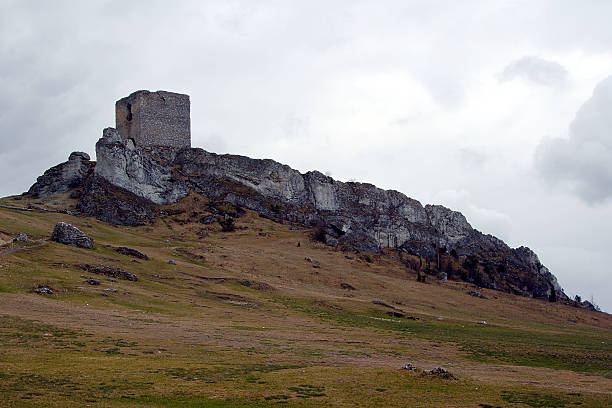 istock rocks and ruined medieval castle 463144187