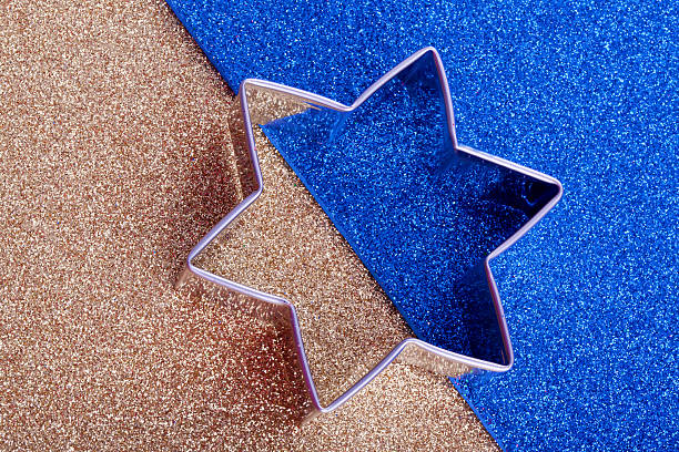 istock star shape cookie cutter on blue and brown 463144205