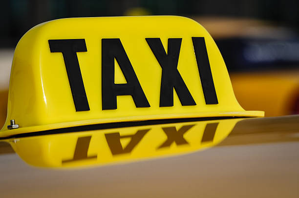 istock Yellow Taxi Cab with Second Vehicle in Background 463152467