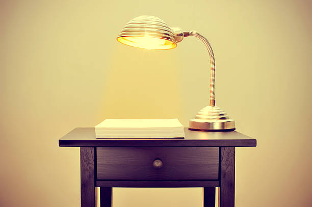 gooseneck lamp and blank paper sheets