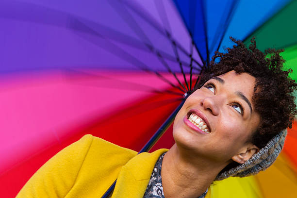 istock Young Woman With Bright Umbrella 463173437