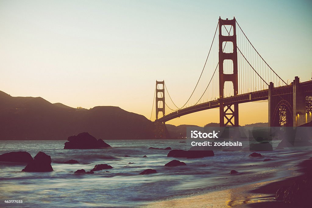 Beach, Ocean and Golden Gate Bridge at Sunset, San Francisco San Francisco Golden Gate bridge at sunset Golden Gate Bridge Stock Photo
