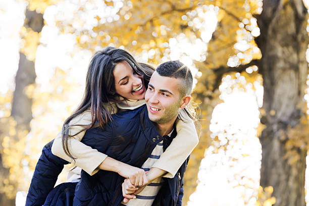 istock Cheerful couple in park 463179519