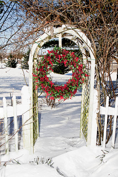 istock Berry Wreath Hanging Within Trellis 463186803