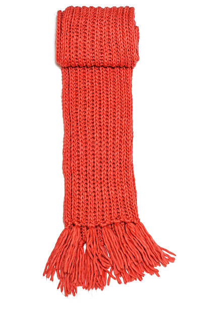 istock A folded red woolen scarf with hairy fringes on one end 463190747