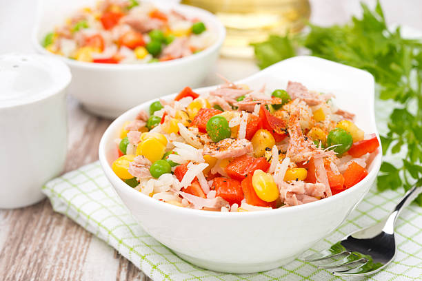 istock salad with corn, green peas, rice, red pepper and tuna 463195561