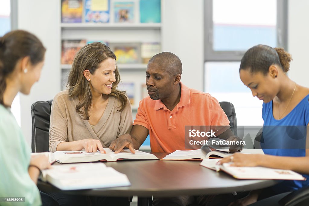 Office Meeting Diverse group of adults studying and working together 30-39 Years Stock Photo