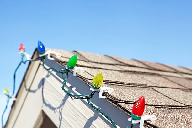 istock LED Christmas Lights on House Roof Peak 463198977