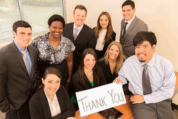 istock Business team holds 'Thank You' sign. 463206543