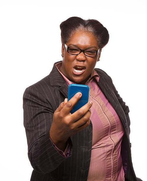 istock Woman angry at mobile phone 463211911
