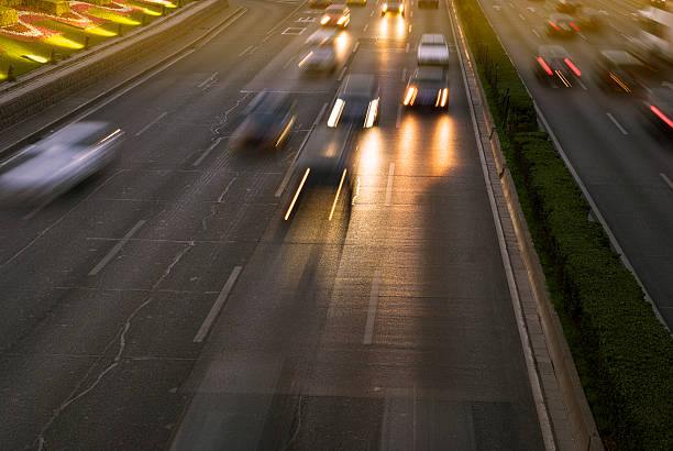 istock Rush hour traffic at night on multiple lane highway 463215285