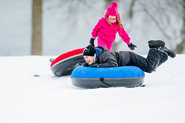 istock Family Tubing in Winter 463216145