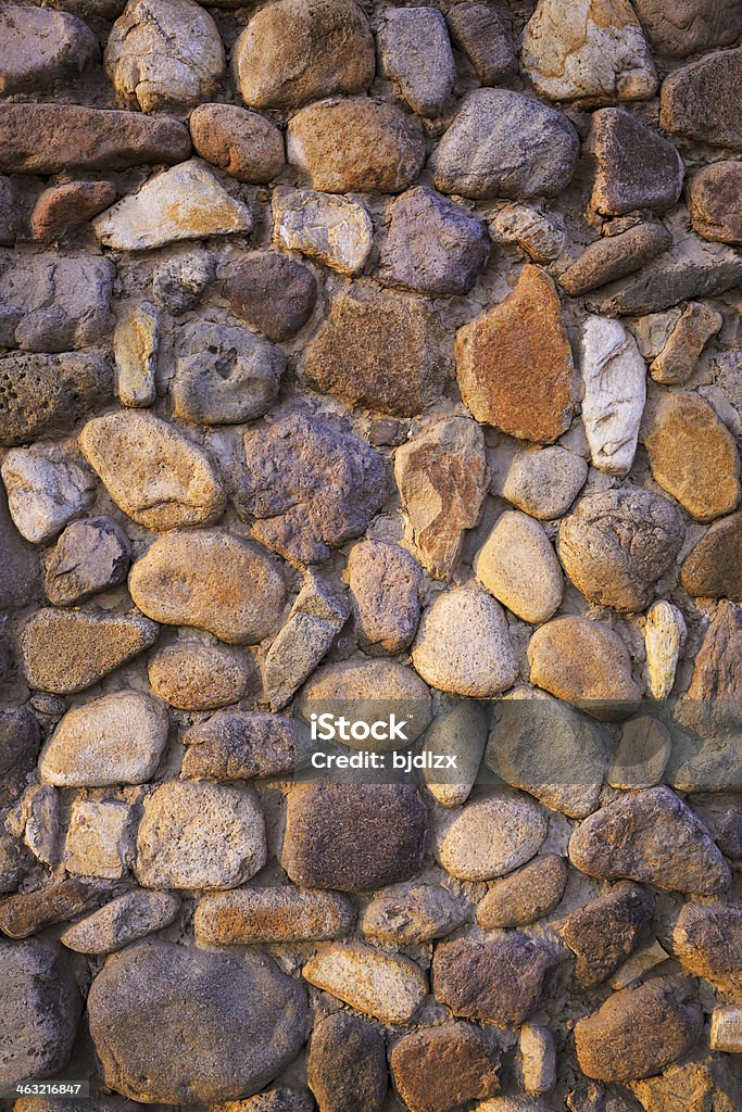 Fondo de pared de piedra - Foto de stock de Amarillo - Color libre de derechos