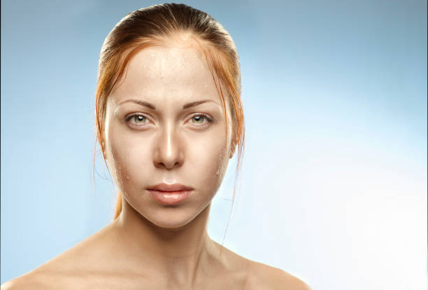 Beautiful woman with wet face stock photo