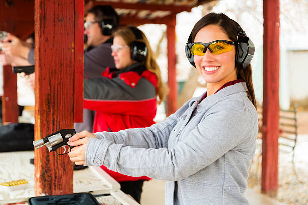 Someone Using Gun 9,800+ Beautiful Woman With Gun Stock Photos, Pictures & Royalty-Free ...
