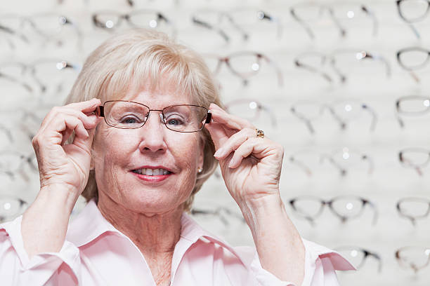 istock Woman trying on eyeglasses 463226503