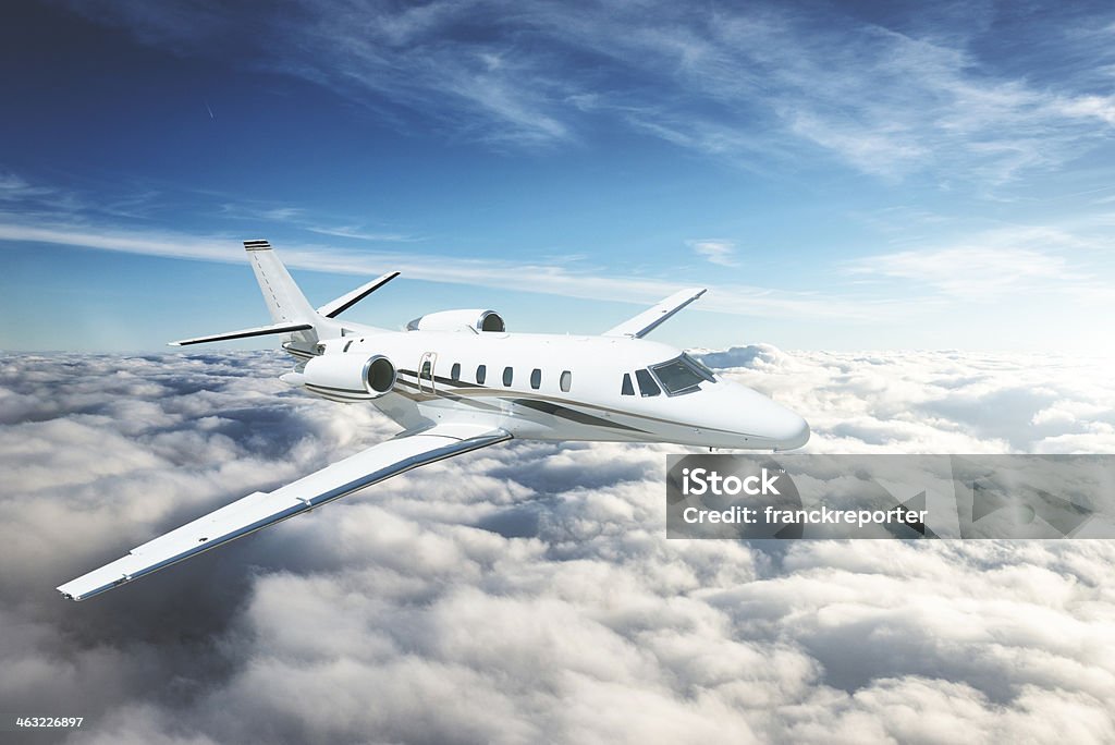 jet flying above the sky http://blogtoscano.altervista.org/AI.jpg  Corporate Jet Stock Photo