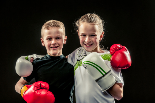 Children boxing for fun.
