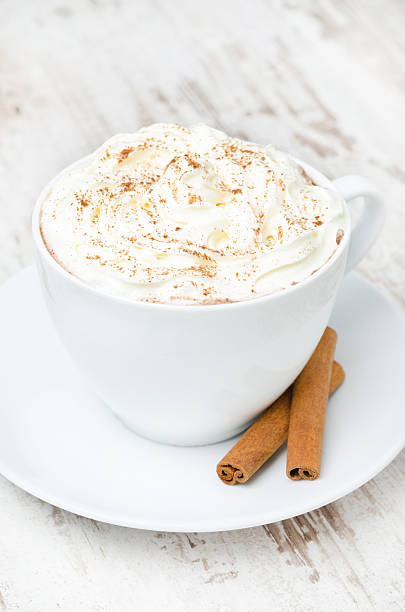 istock cup of cocoa with cinnamon and whipped cream 463229751