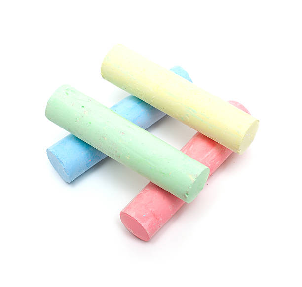 istock chalks in a variety of colors arranged on white background 463236945